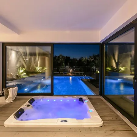 Vikendica Omnia Mit Whirlpool By Interhome